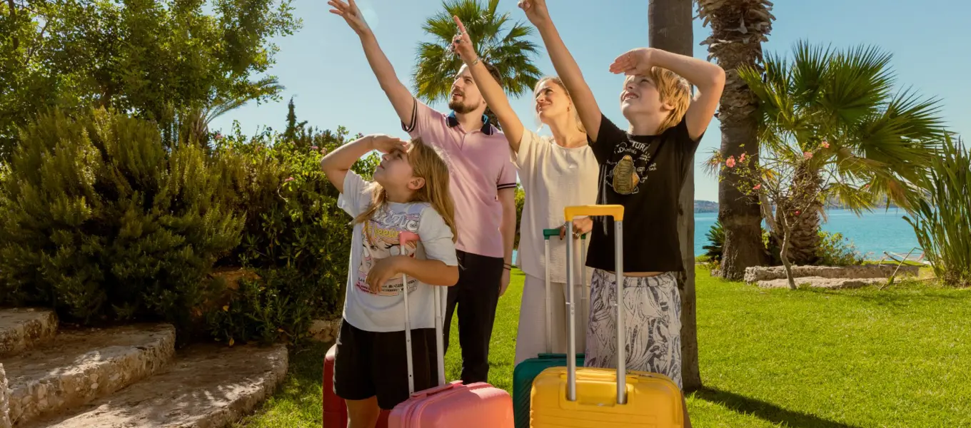 Family Looking At Airplane