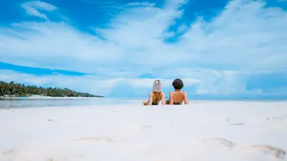 People Laying On A Beach