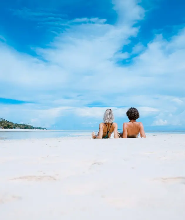 People Laying On A Beach