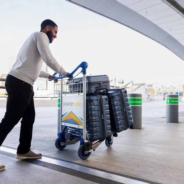 DFW Customer Pushing Cart Outside